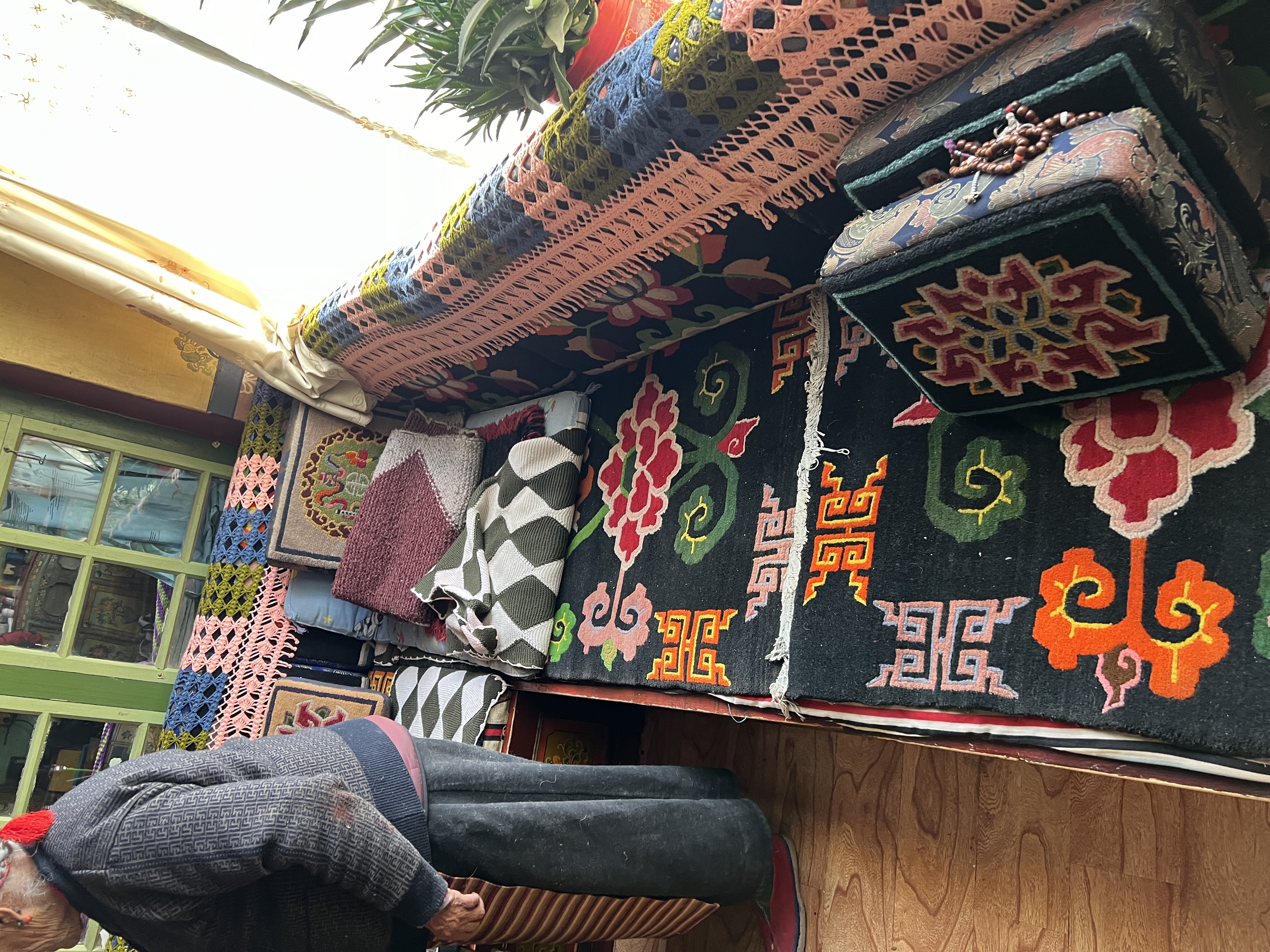 Traditional Tibetan carpet patterns with dragon and phoenix motifs